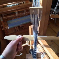 loom fairy weaving a band